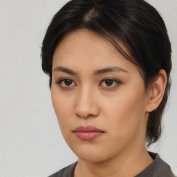 Neutral asian young-adult female with medium  brown hair and brown eyes