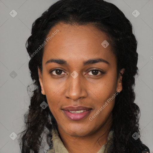 Joyful black young-adult female with long  black hair and brown eyes