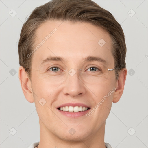 Joyful white adult male with short  brown hair and grey eyes