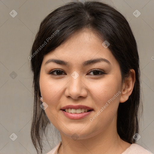 Joyful asian young-adult female with medium  brown hair and brown eyes