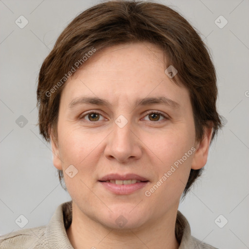 Joyful white adult female with medium  brown hair and grey eyes