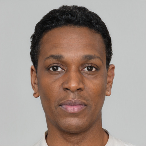 Neutral black young-adult male with short  black hair and brown eyes