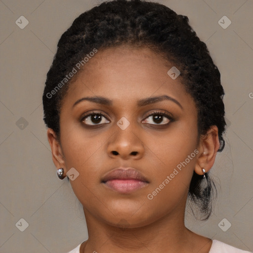 Neutral black young-adult female with medium  brown hair and brown eyes