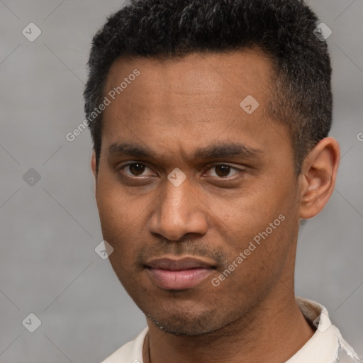 Neutral latino young-adult male with short  brown hair and brown eyes