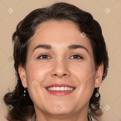 Joyful white adult female with medium  brown hair and brown eyes