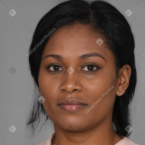 Joyful black young-adult female with medium  black hair and brown eyes