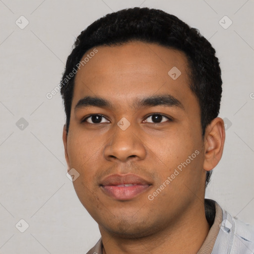 Neutral latino young-adult male with short  black hair and brown eyes