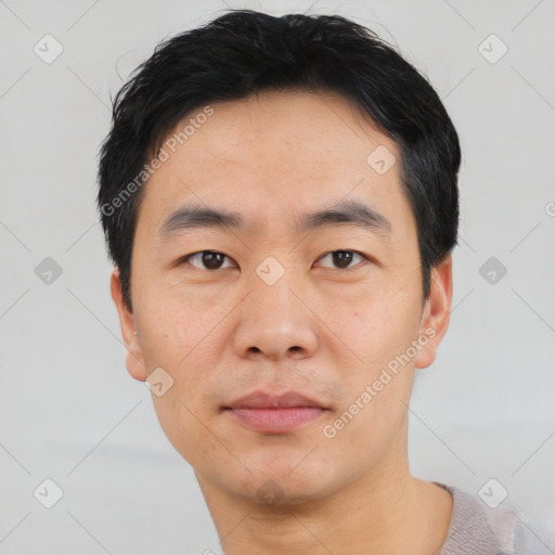 Neutral asian young-adult male with short  black hair and brown eyes