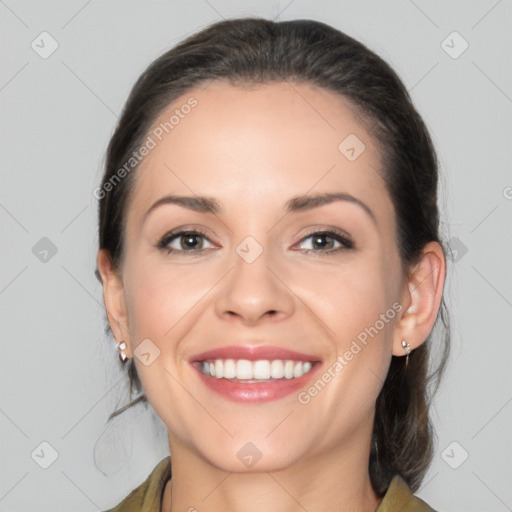 Joyful white young-adult female with medium  brown hair and brown eyes