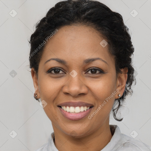 Joyful latino young-adult female with short  black hair and brown eyes