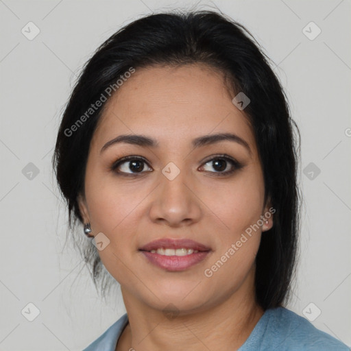 Joyful latino young-adult female with medium  brown hair and brown eyes