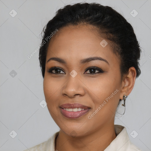 Joyful latino young-adult female with short  black hair and brown eyes