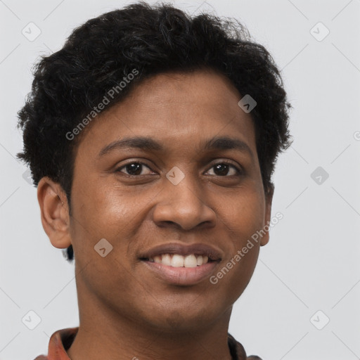 Joyful black young-adult male with short  brown hair and brown eyes