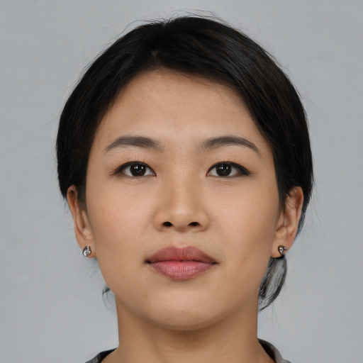 Neutral asian young-adult female with medium  black hair and brown eyes
