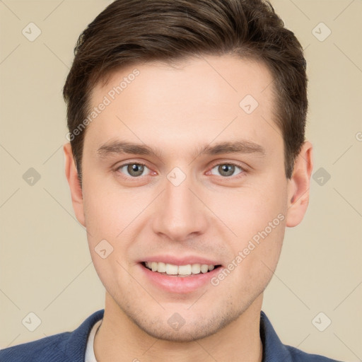 Joyful white young-adult male with short  brown hair and grey eyes