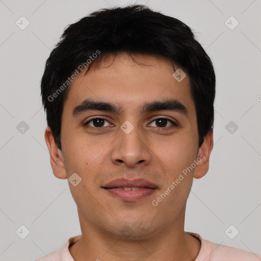 Joyful white young-adult male with short  black hair and brown eyes