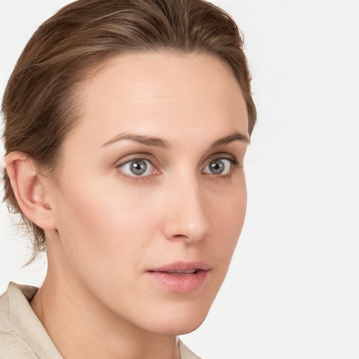 Neutral white young-adult female with medium  brown hair and grey eyes