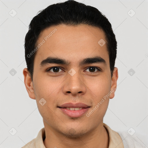 Joyful latino young-adult male with short  black hair and brown eyes