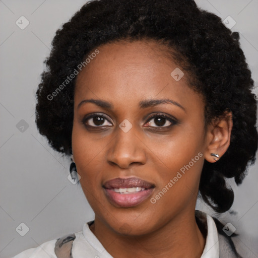 Joyful black young-adult female with medium  black hair and brown eyes