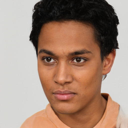 Neutral latino young-adult male with short  black hair and brown eyes