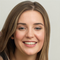 Joyful white young-adult female with long  brown hair and green eyes