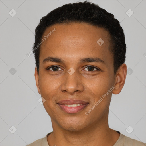 Joyful black young-adult male with short  black hair and brown eyes