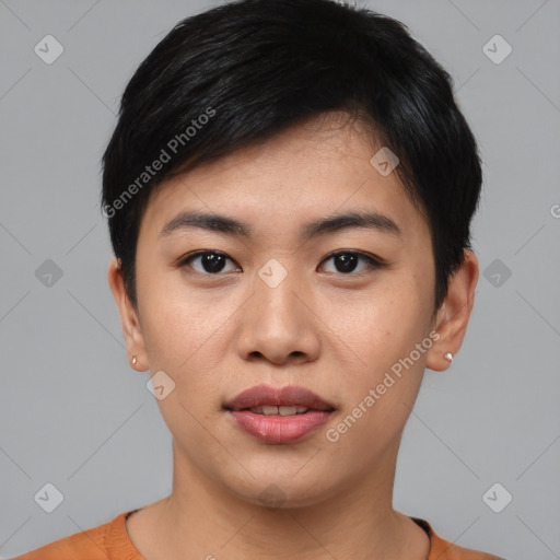 Joyful asian young-adult male with short  black hair and brown eyes