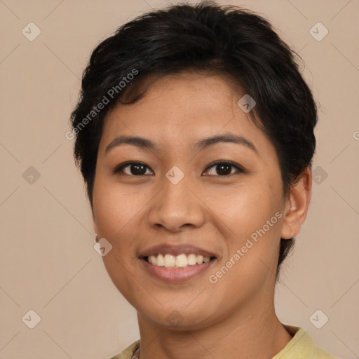 Joyful asian young-adult female with short  brown hair and brown eyes