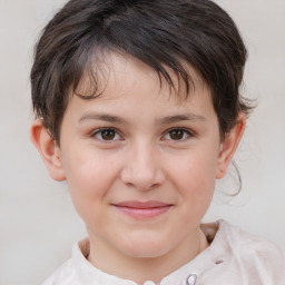 Joyful white child female with short  brown hair and brown eyes