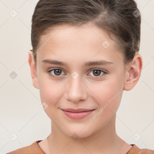 Joyful white child female with short  brown hair and brown eyes