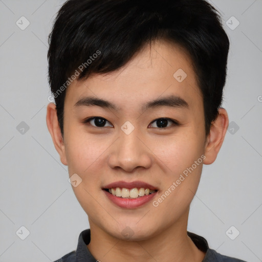 Joyful asian young-adult male with short  black hair and brown eyes
