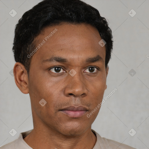 Neutral latino adult male with short  black hair and brown eyes