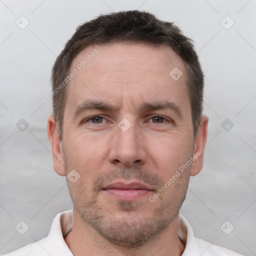 Neutral white adult male with short  brown hair and brown eyes