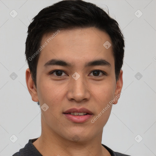 Joyful white young-adult male with short  black hair and brown eyes