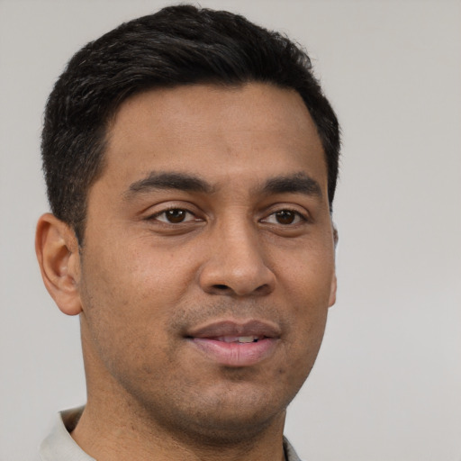 Neutral latino young-adult male with short  brown hair and brown eyes