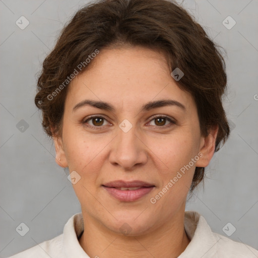 Joyful white adult female with short  brown hair and brown eyes