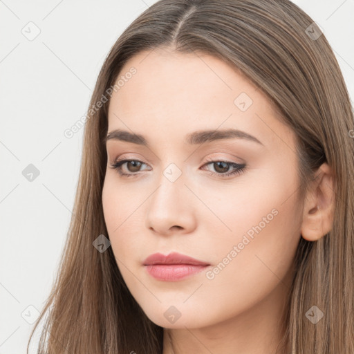 Neutral white young-adult female with long  brown hair and brown eyes