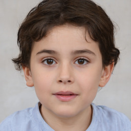 Joyful white child male with short  brown hair and brown eyes