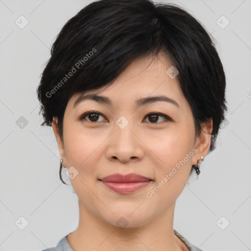 Joyful asian young-adult female with medium  brown hair and brown eyes