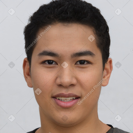 Joyful latino young-adult male with short  brown hair and brown eyes