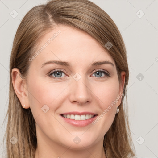 Joyful white young-adult female with long  brown hair and grey eyes