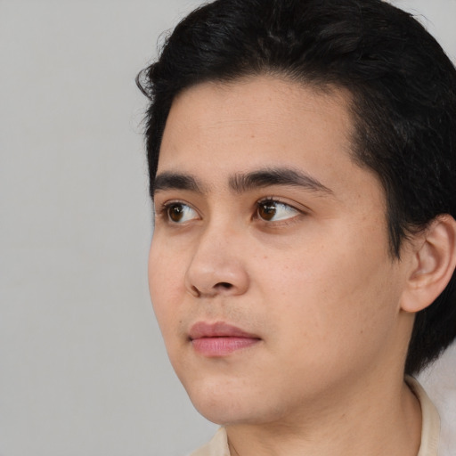 Neutral white young-adult male with short  black hair and brown eyes