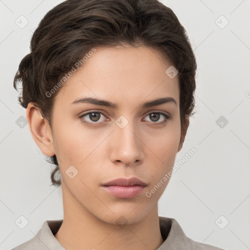 Neutral white young-adult female with short  brown hair and brown eyes