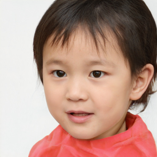 Joyful white child female with short  brown hair and brown eyes