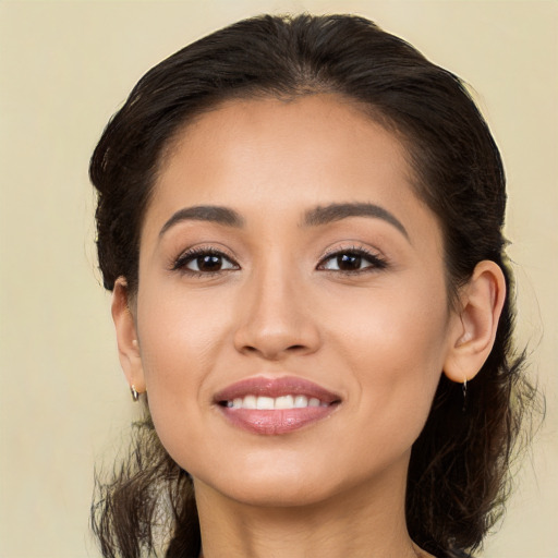 Joyful white young-adult female with long  brown hair and brown eyes