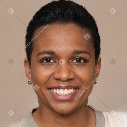 Joyful black young-adult female with short  black hair and brown eyes