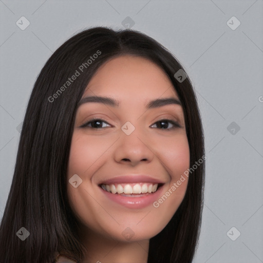 Joyful white young-adult female with long  black hair and brown eyes