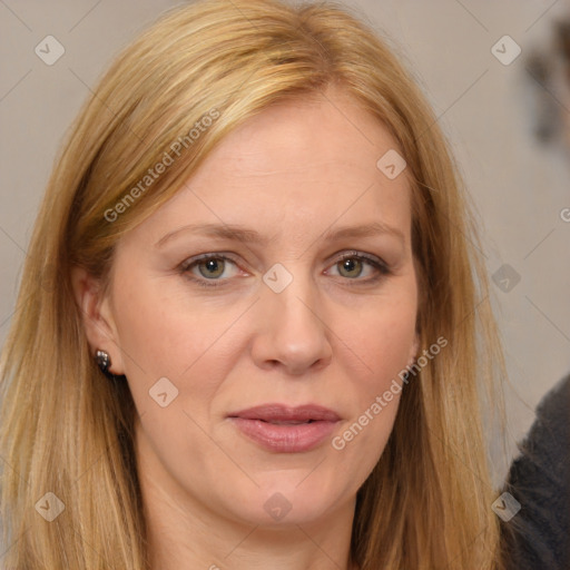 Joyful white adult female with long  brown hair and brown eyes