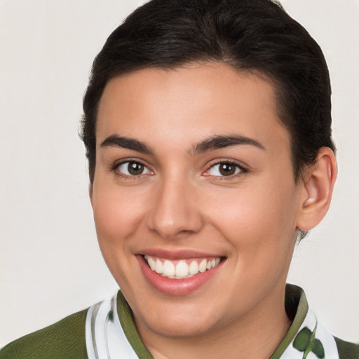 Joyful white young-adult female with short  brown hair and brown eyes