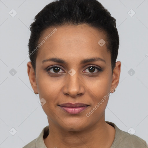 Joyful black young-adult female with short  brown hair and brown eyes